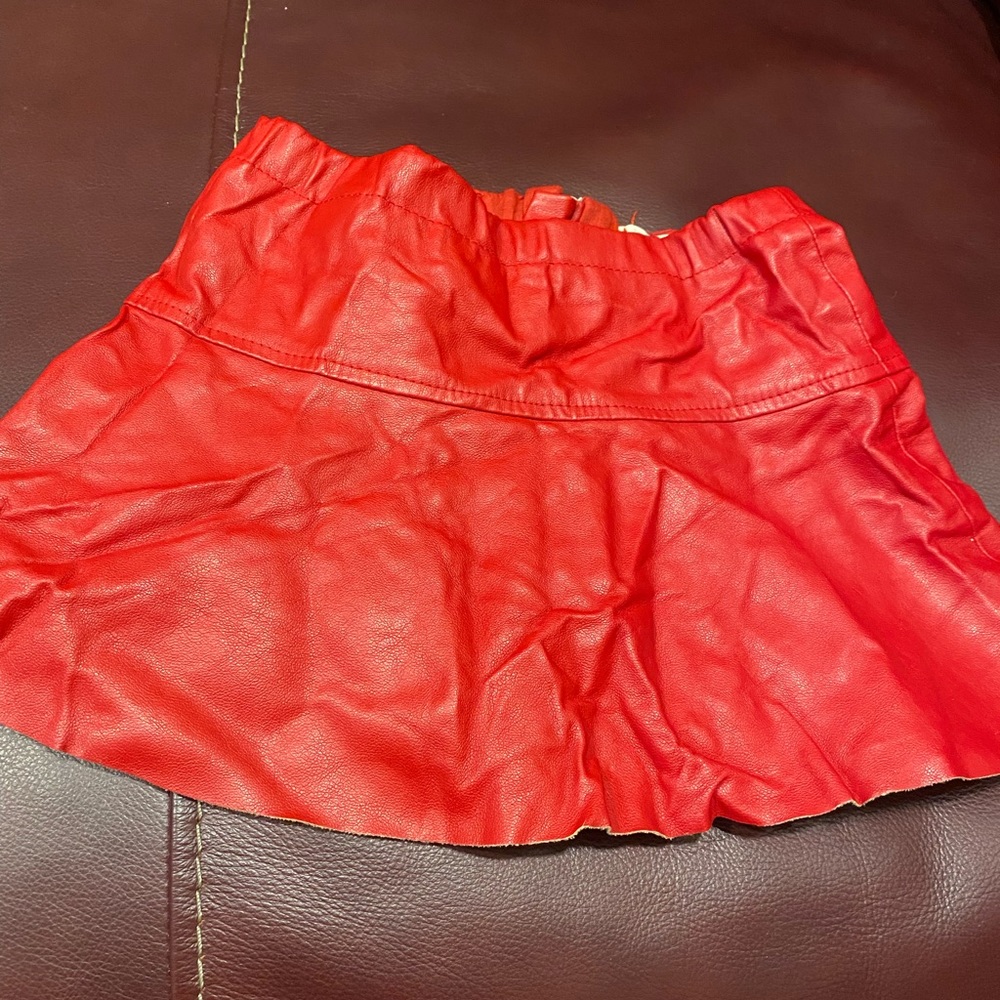 Red leather skirt